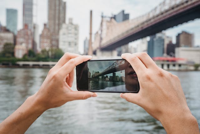 Someone taking photo of a bridge