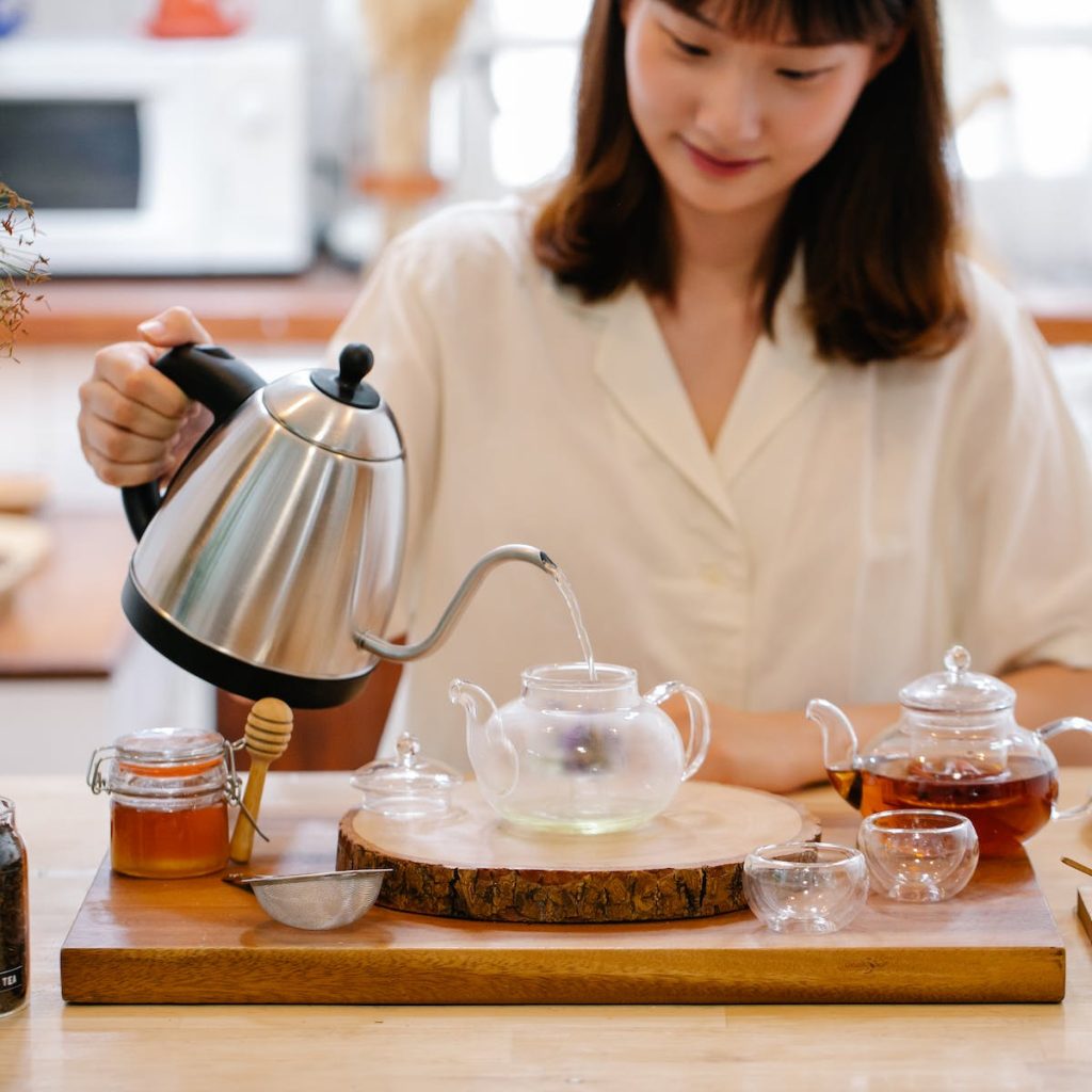 woman brewing tea