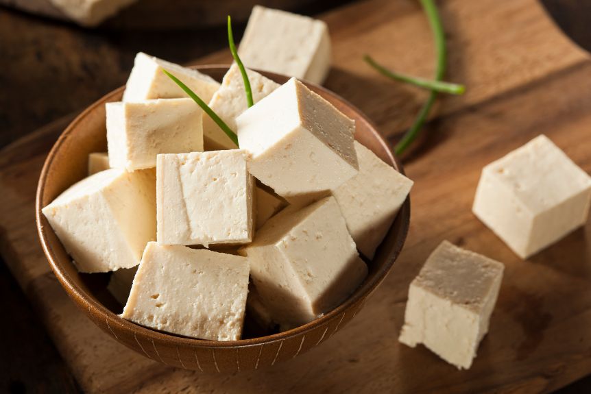 Slices of Japanese agedashi tofu in a bowl.