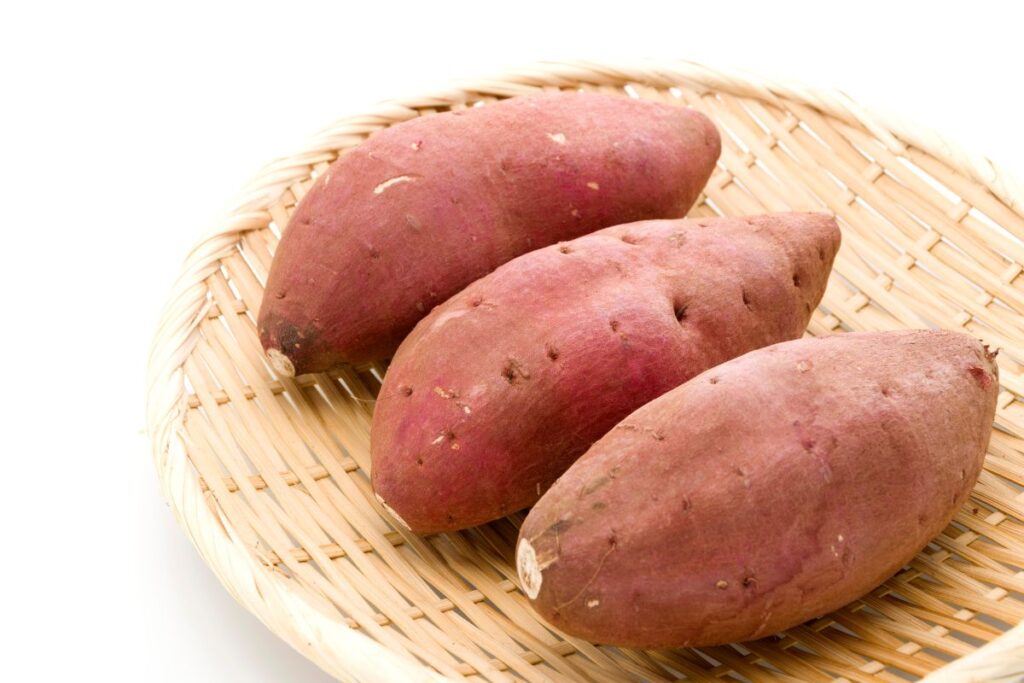 Japanese sweet potatoes on a wooden plate