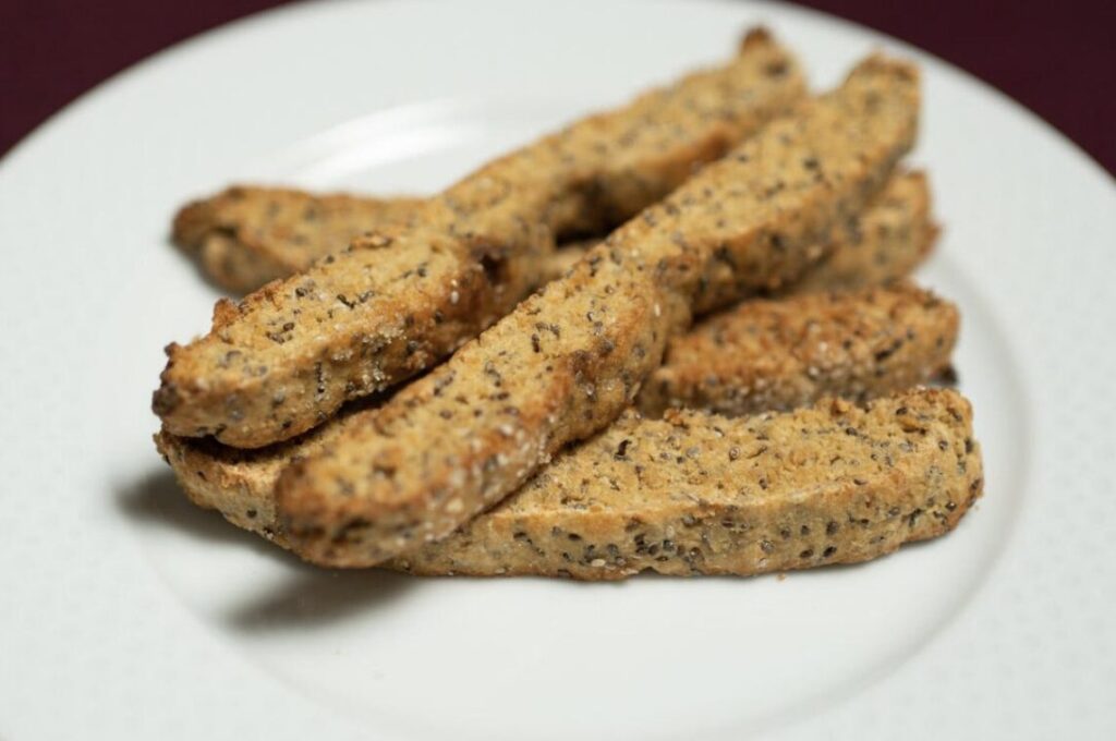 Okara-biscotti-with-chia-seeds-in-a-white-plate